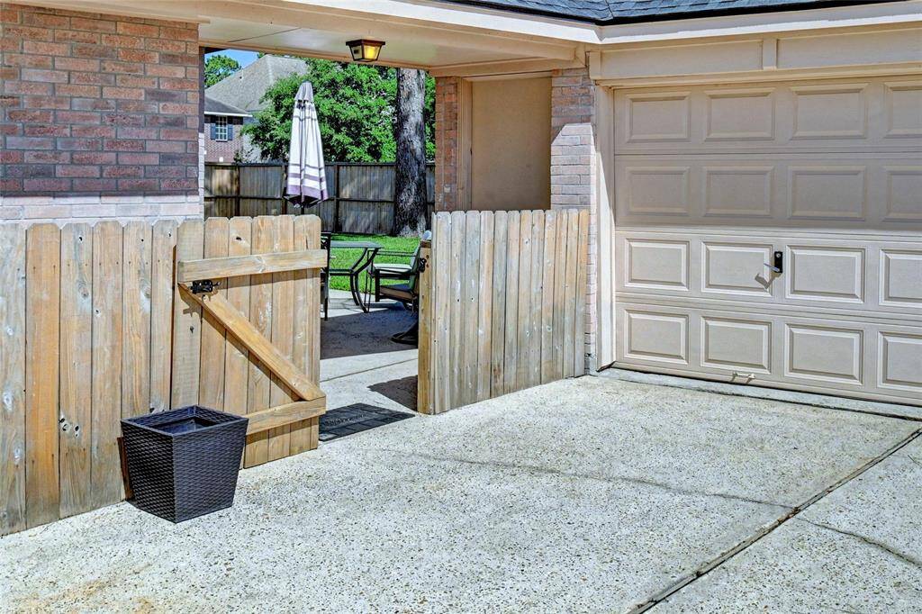 Privacy fence to backyard patio.