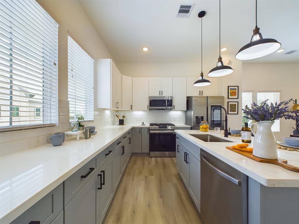 Photos from another community by the same builder, FINISHES & COLORS MAY VARY! Ceiling fans are not included!