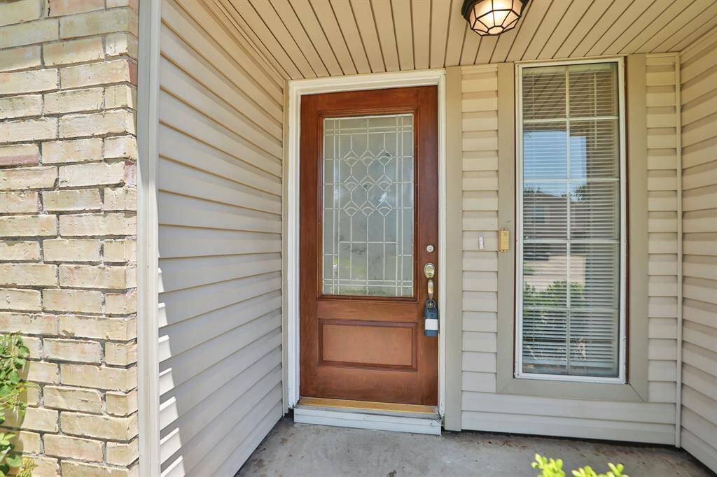 beautiful front door with inlaid glass