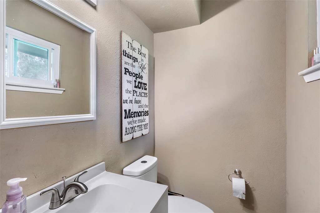 Half bath in primary suite.