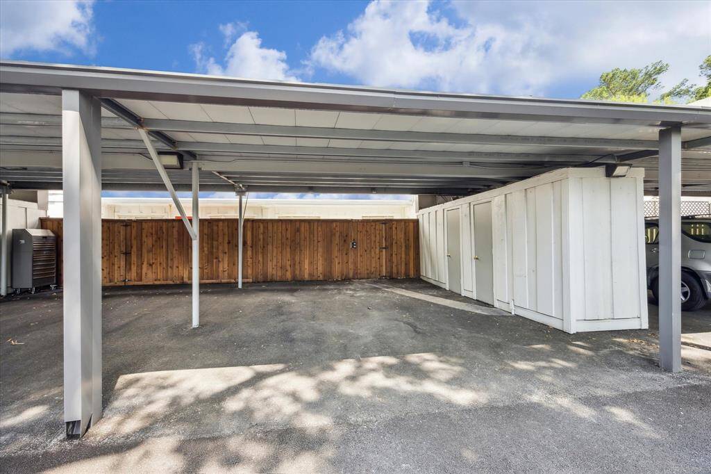 2 car carport located behind the home.