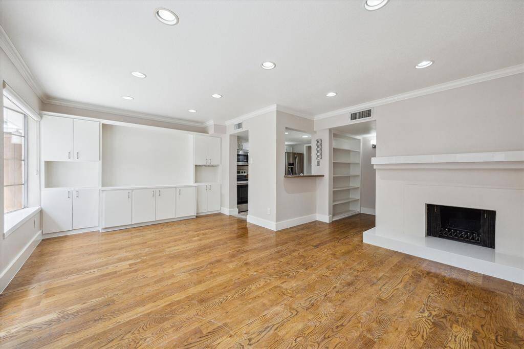 built ins in the Breakfast Room.  The kitchen opens to the Den.