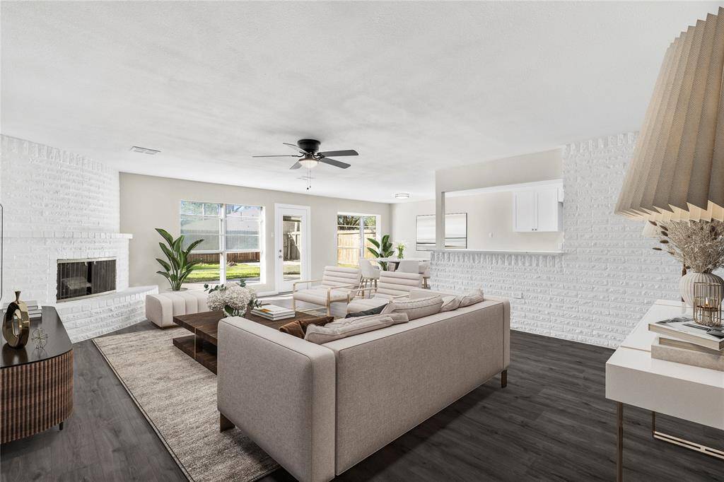 This living space connects effortlessly to the breakfast room and kitchen bar, creating an open and comfortable area for everyday living. *Virtual staging*