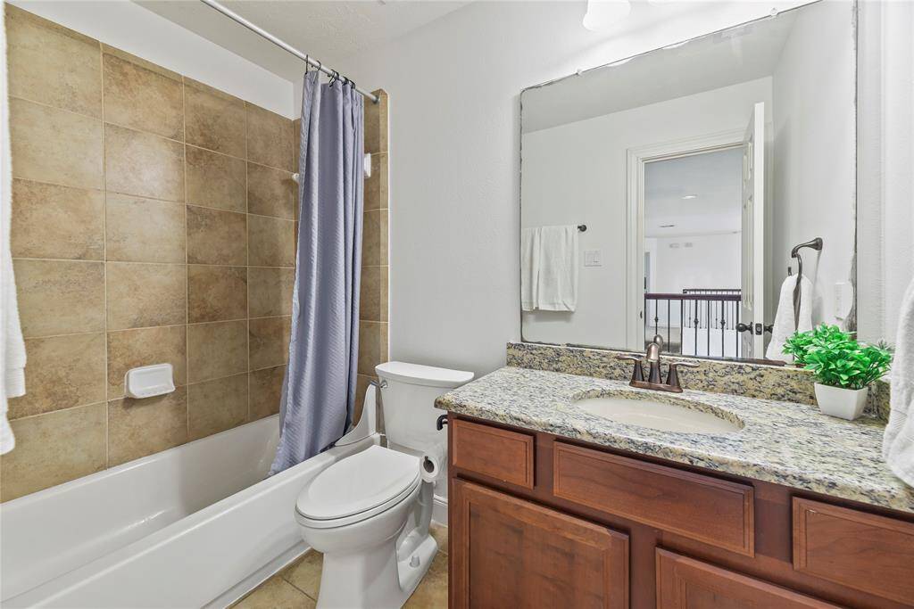 Each full bathroom has a storage vanity with ample room for tucking away extra self-care items and household essentials.
