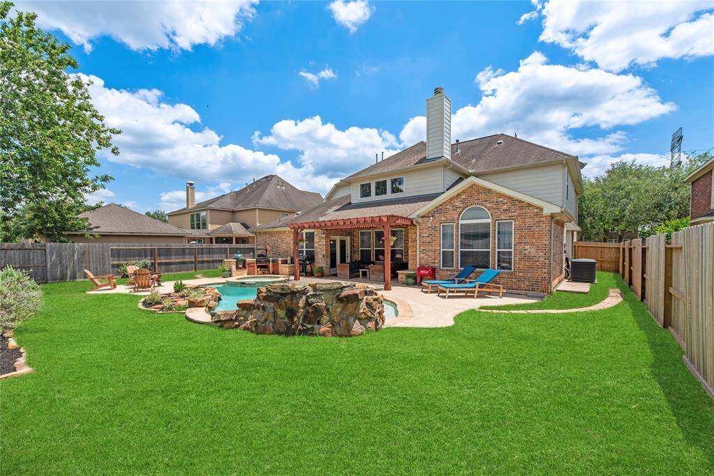 Level and flat, the outdoor space is perfect for playing a game of tag or kickball. For extra fun, set up a playground area for the kids or install raised garden beds for fresh veggies and fruits.