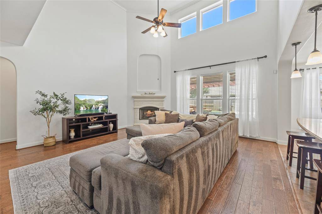 Entertaining is a cinch with an open floor plan. Watch the game in the living room, while others gather in the kitchen around the spread of appetizers, chips, and dip.