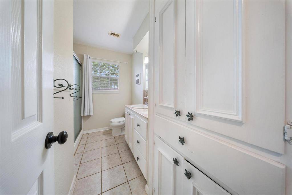 Complete bathroom featuring a spacious shower for your comfort and convenience.