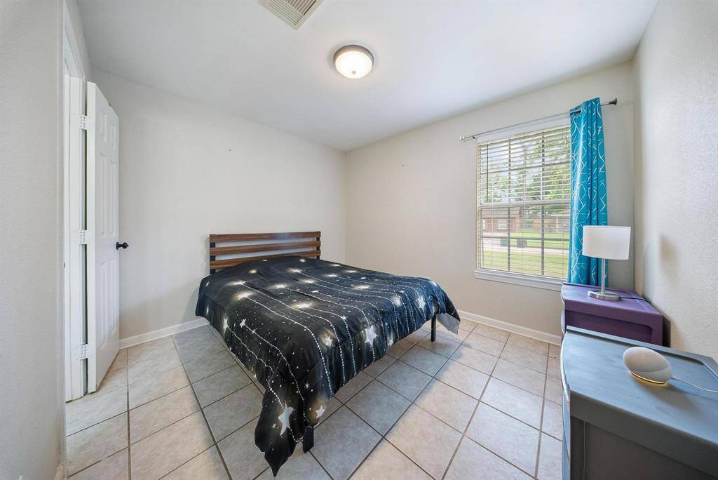 Primary suite offering comfort and tranquility.