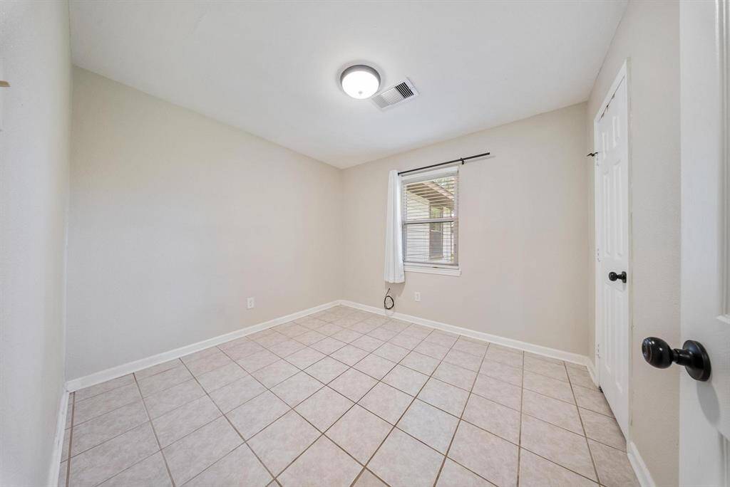 Versatile secondary bedroom, offering ample space for various needs.