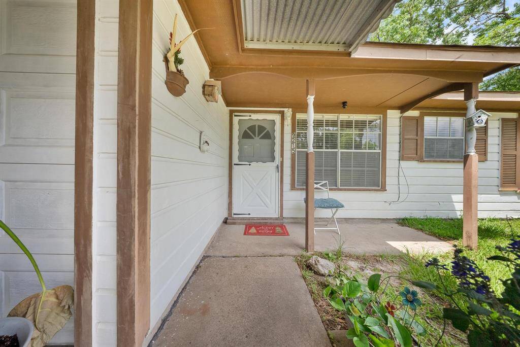 A glimpse of the inviting front entry, offering a warm welcome to your home.