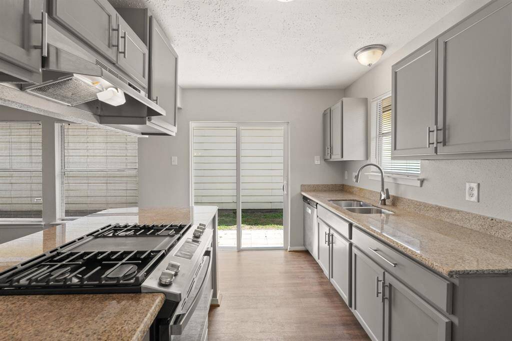 The open kitchen is beautiful, inviting, and functional. It just might make cooking those family meals fun!