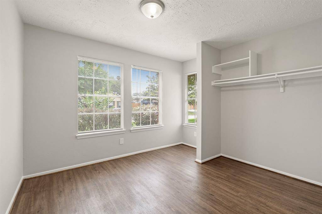 The thoughtfully designed layout of your second bedroom allows for natural light to flood the room, creating a warm and welcoming atmosphere.