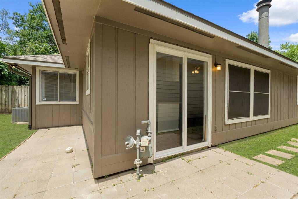 The outdoor patio is beautifully paved, adding a stylish and durable touch to the space.