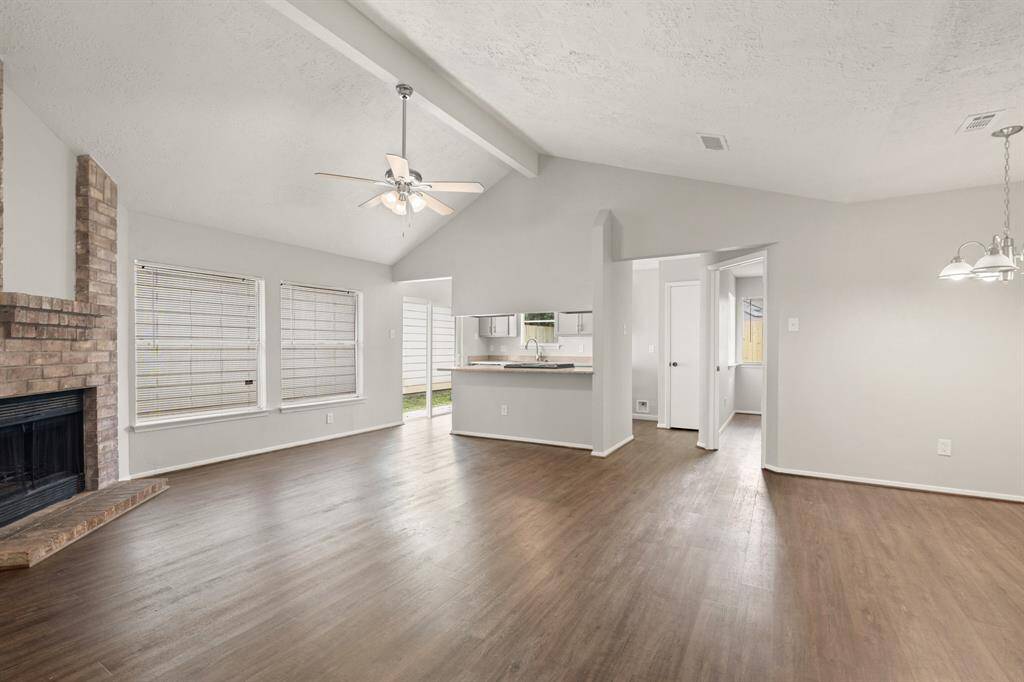 Upon entering the home, you’re welcomed by beautiful vinyl wood plank flooring that flows seamlessly throughout the open-concept living space. The windows flood the home with natural light, creating a bright and inviting atmosphere perfect for both relaxing and entertaining.