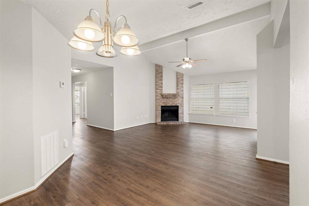 As you look into the living area, you're greeted by a spacious, open layout that offers plenty of room for comfortable seating and entertaining.