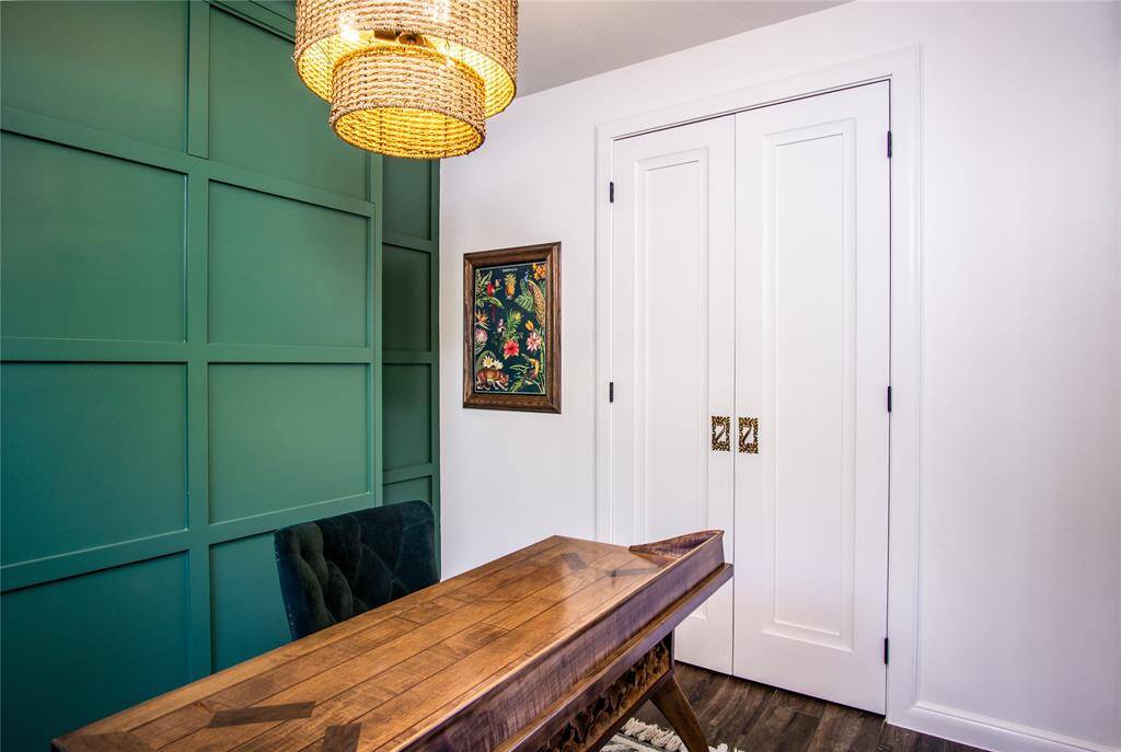 Oversized, new doors were added to the customized closet in the office.
