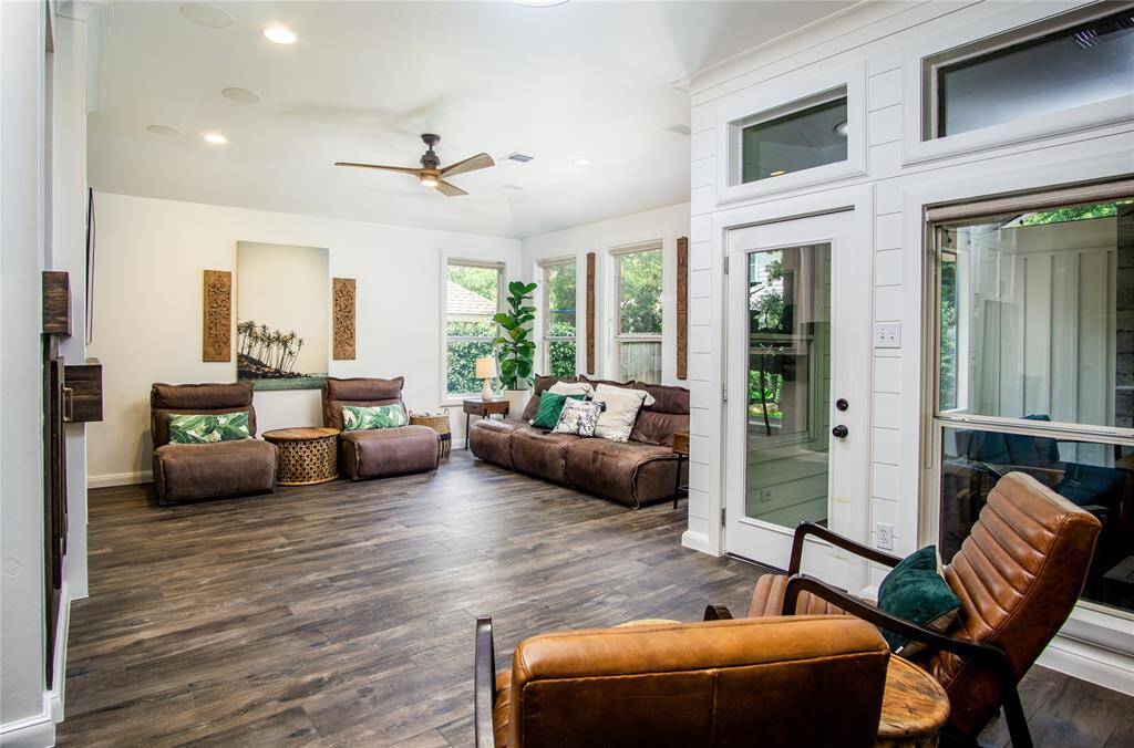 Gorgeous space that flows nicely for entertaining. Large, covered screened in patio is accessible through the door shown here.