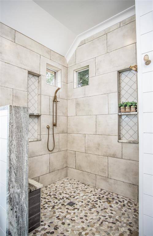 Grand walk-in shower. You'll never want to shower away from home after experiencing this!