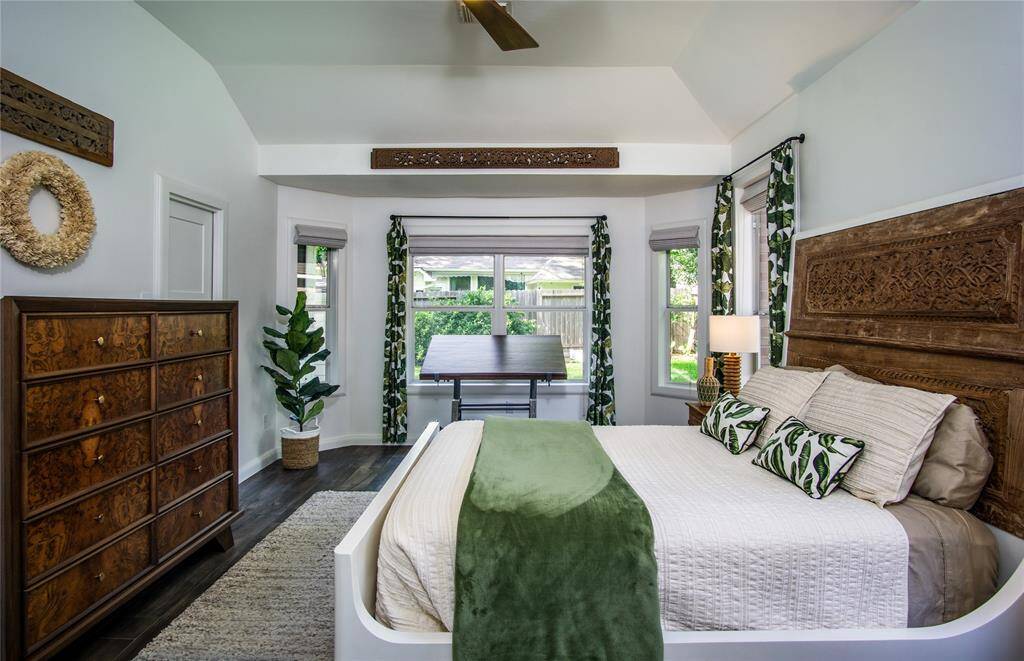 Lovely views of the beautiful backyard. Bay window area with space for seating or a drafting table. Custom window coverings pull up allowing lots of light during the day but are light blocking when you need it.