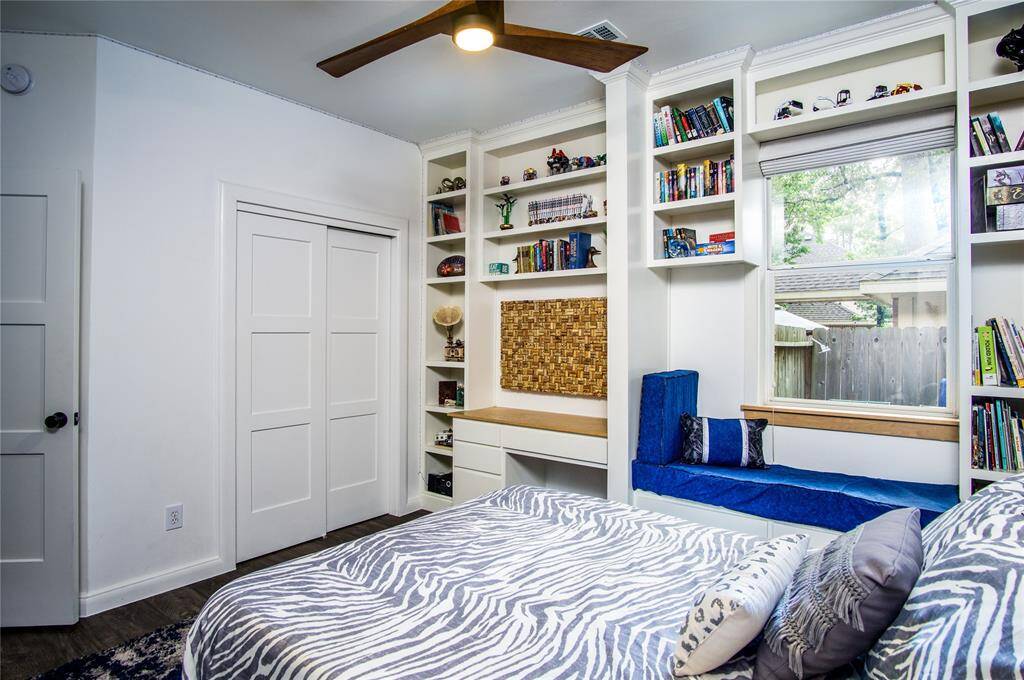 Notice the updated 3-panel doors installed throughout the home. This bedroom features a hidden 2-level hide-away that is every kiddos dream!