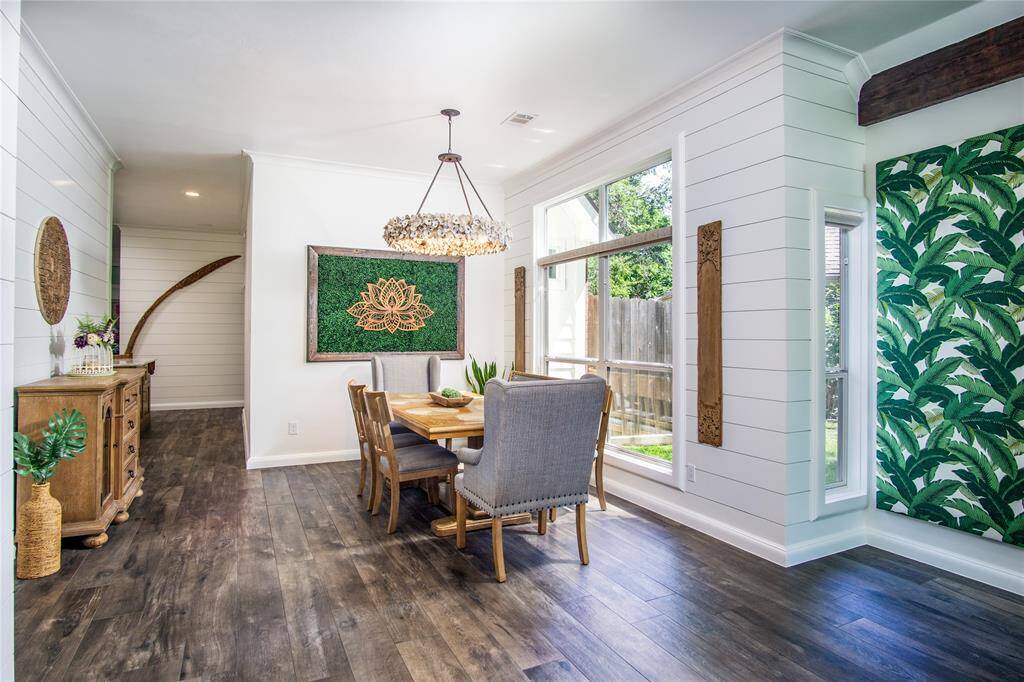The entire home was retextured in a subtle, plaster-like texture. Wood, shiplap paneling added for design & timeless appeal. Beautiful tile floors throughout the entire main floor.