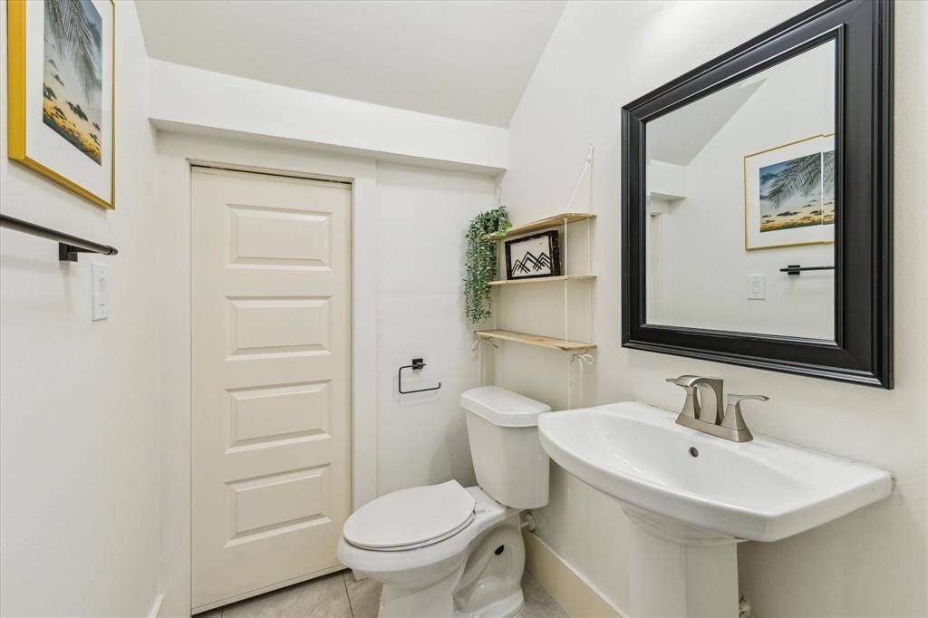 Half bath conveniently located on the first floor with a large closet.