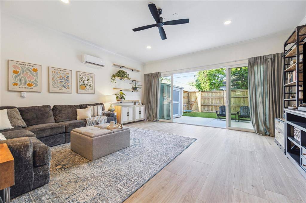 This large living room is a welcomed addition with tons of natural light.