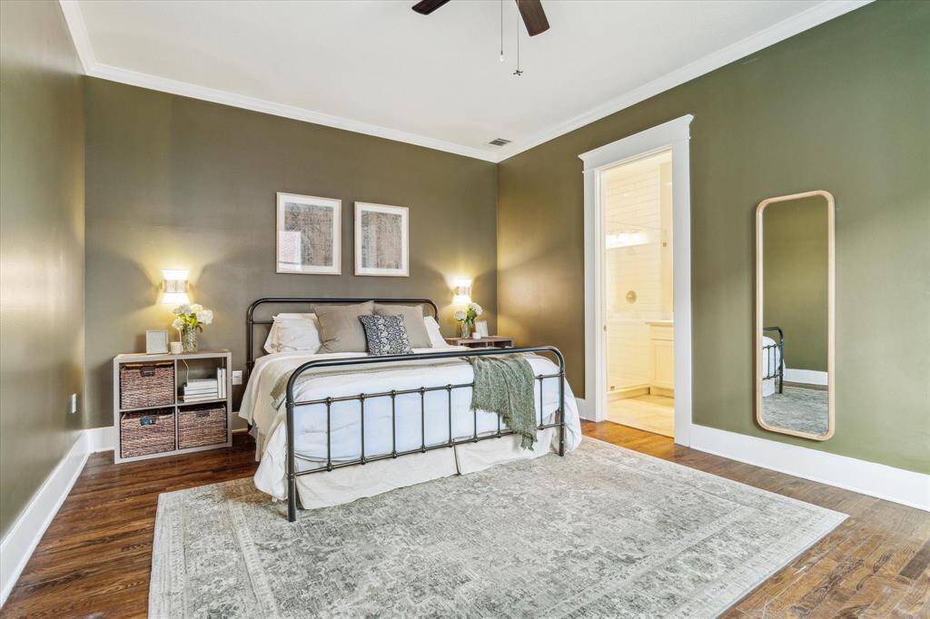 Beautiful primary bedroom with plenty of space for a king-size bed and side tables.