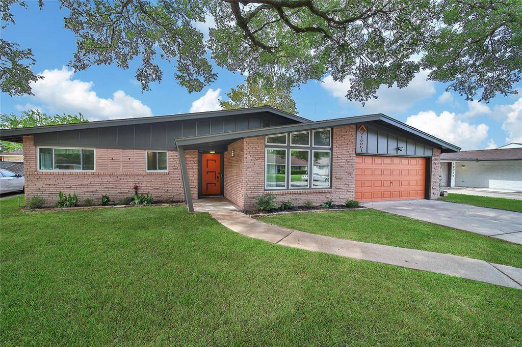 This property features a two car attached garage and beautiful mature trees.