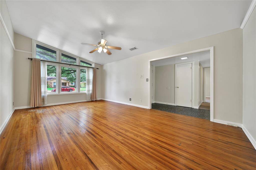 Spacious formal living area with high ceilings.