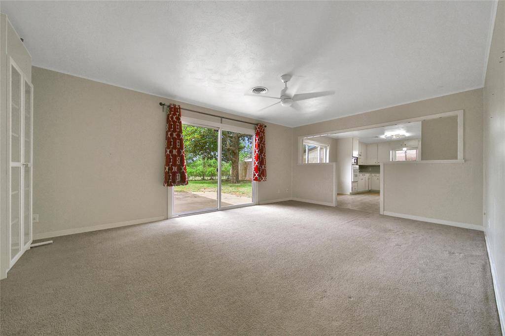 Large family room with backyard views.