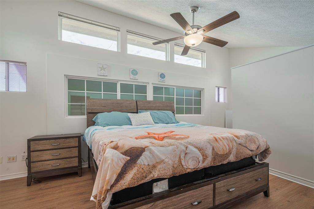 The unique loft-style primary ensuite is stylish yet inviting!