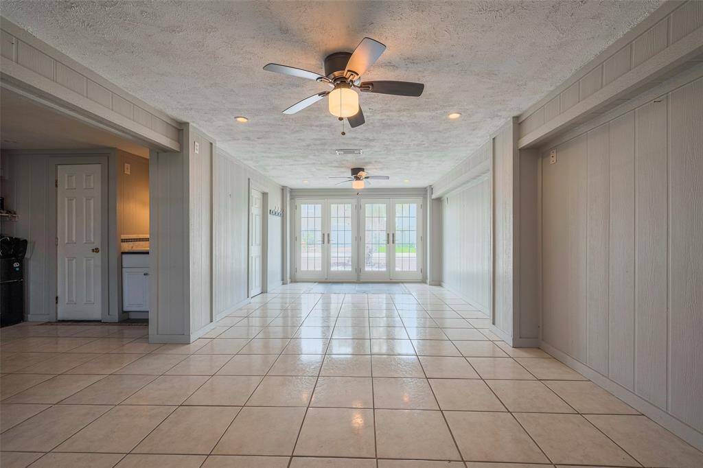 The downstairs flex space also has great natural lighting and has an extra sink and tons of extra storage space to the left