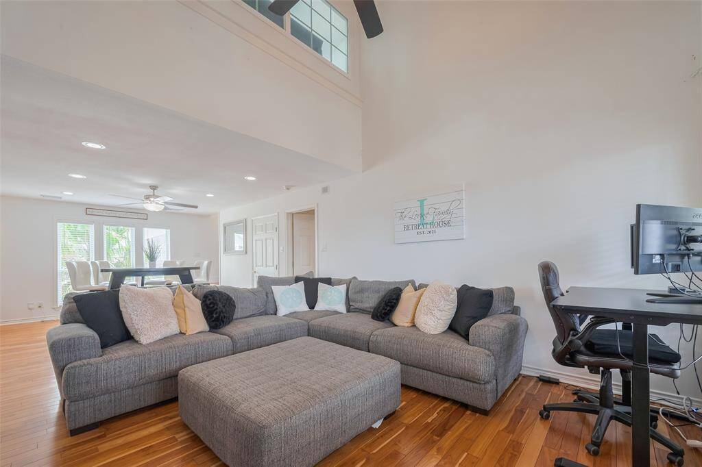 Tons of natural light in the living/dining area with rare high ceilings!