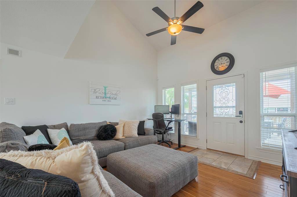 The living room has great views of the gorgeous expanded deck!