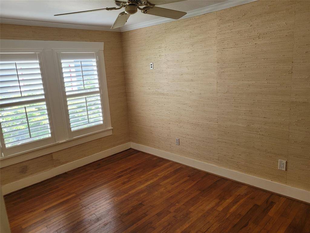 Study, 3rd bedroom, or flex room with built-ins at the front of the home.