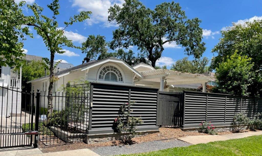 Expanded parking inside the driveway gate.