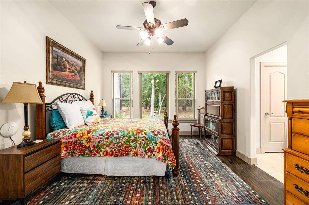 An additional secondary bedroom features its own walk-in closet, providing ample storage