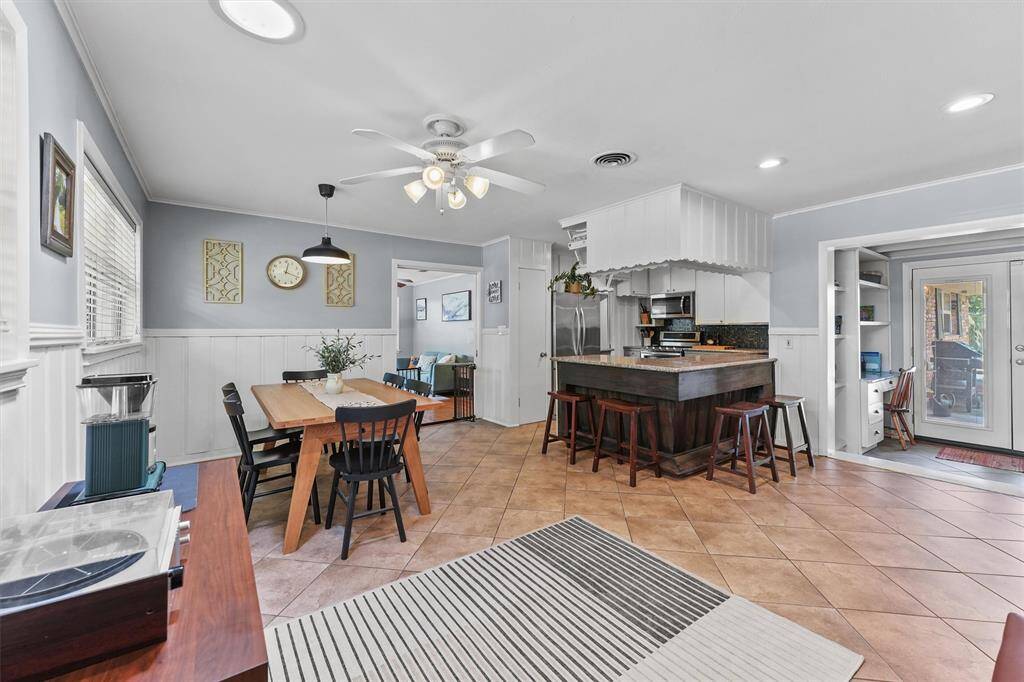 View from what could be used as a small extra family room to the dining/kitchen.