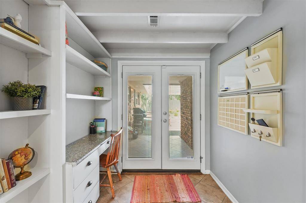 Built in desk area off the kitchen!  Great use of space for work from home or homework needs.