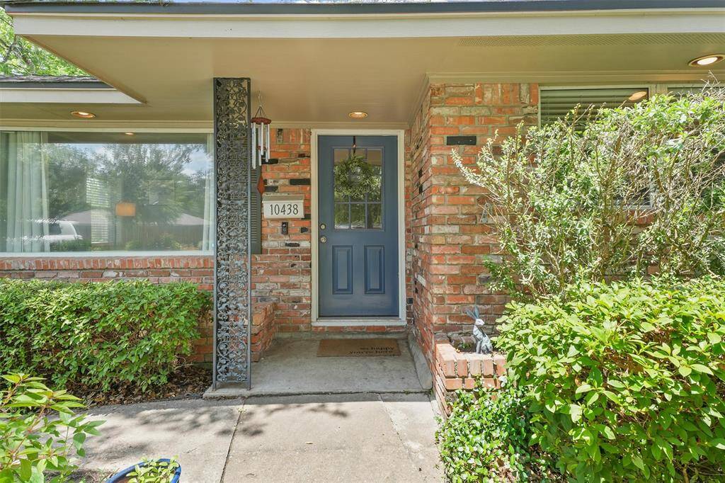 Covered porch protects your packages and guests from the rain.