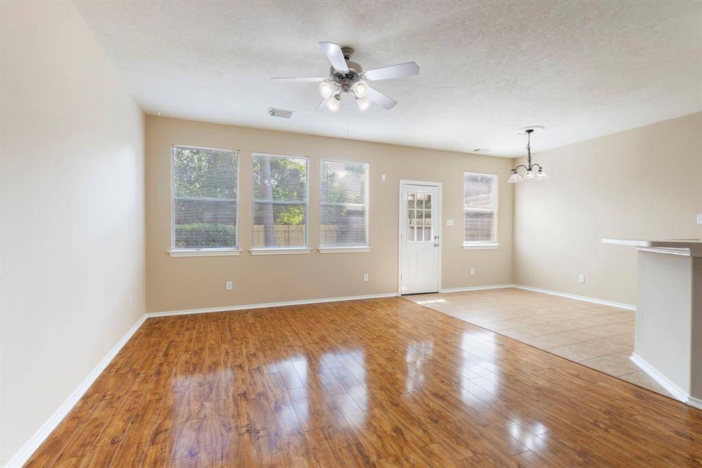 family room enhanced w lots of windows!