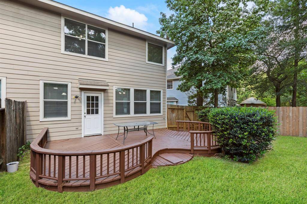 the large backyard and deck are perfect for outdoor activities.