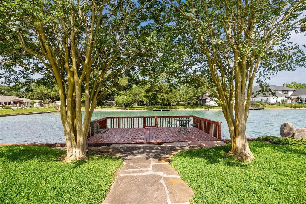 The backyard of 107 Capri St. is large, and it also has a great view of the lake.