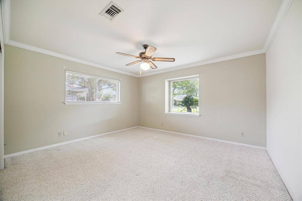 This is the first bedroom to the right when enter the hallway. Window faces the frontyard