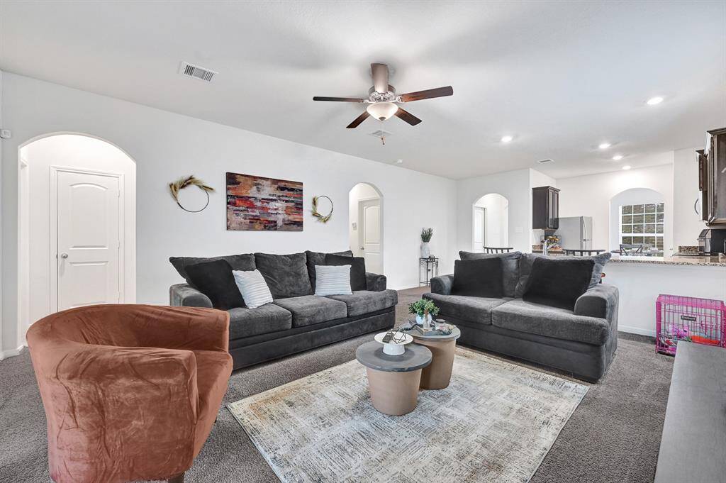 This home features arched doorways that make the passageways feel taller and more open.
