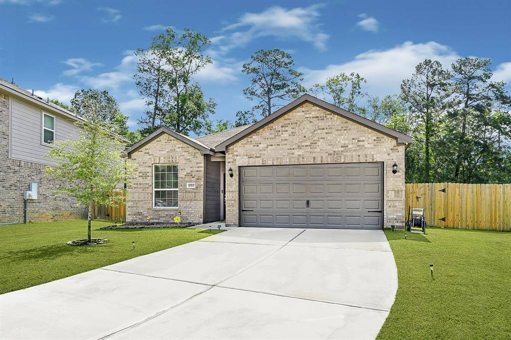 This home has a generously sized driveway; plenty of space for parking or a basketball net!
