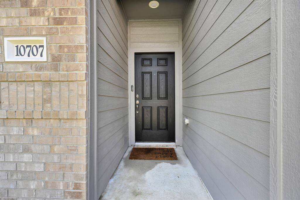 Imagine personalizing the entry with a colorful outdoor rug!