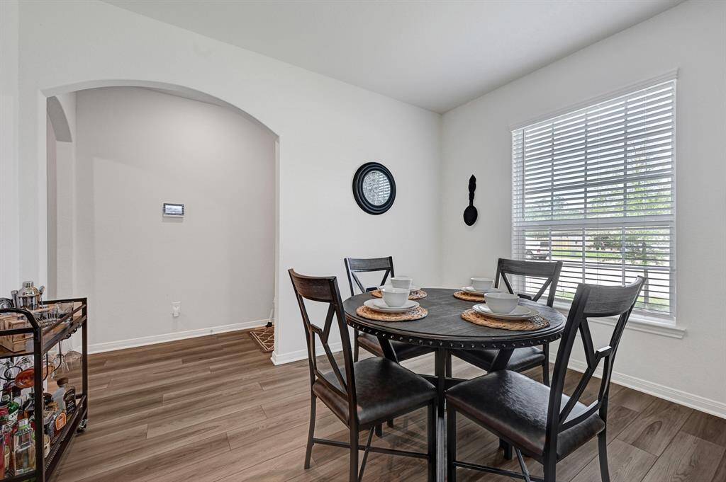 Although the dining area is separate, the large openings makes this room feel connected to the rest of the home.