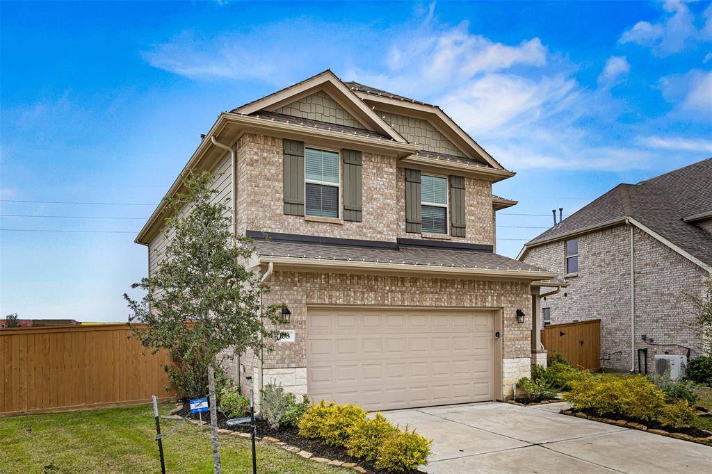 Relax and enjoy a beautiful sunset and butterfly garden sitting in the front porch